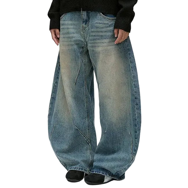 Wide-Leg Washed Blue Jeans with Curved Seam Detail