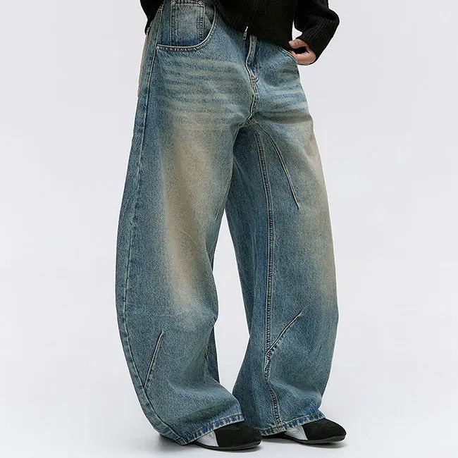 Wide-Leg Washed Blue Jeans with Curved Seam Detail