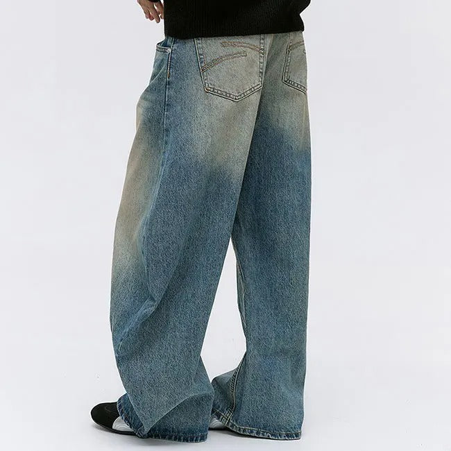 Wide-Leg Washed Blue Jeans with Curved Seam Detail