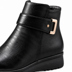 Black ankle boot buckle detail