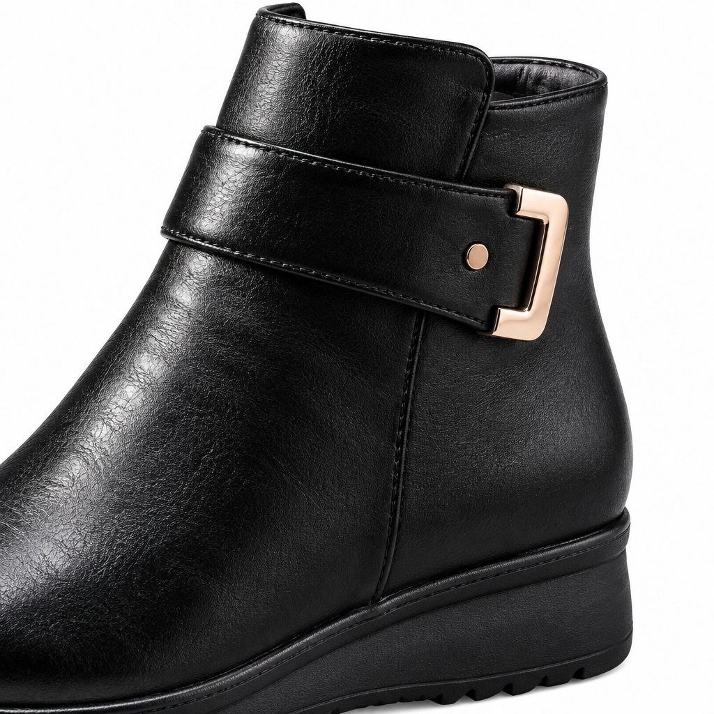 Black ankle boot buckle detail
