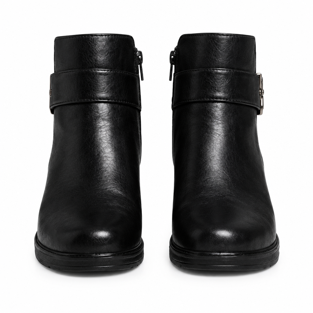 Black ankle boots on white background