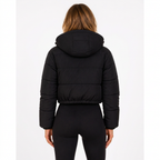 Black cropped hooded puffer jacket, back view on white background