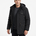 Man wearing black fleece-lined winter parka
