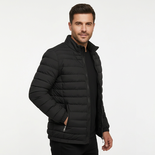 Man modelling black quilted jacket, three-quarter view on white background