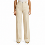 Beige trousers on model, waist-to-shoes view