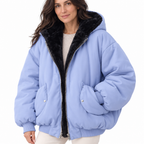 Woman modelling a black hooded puffer jacket